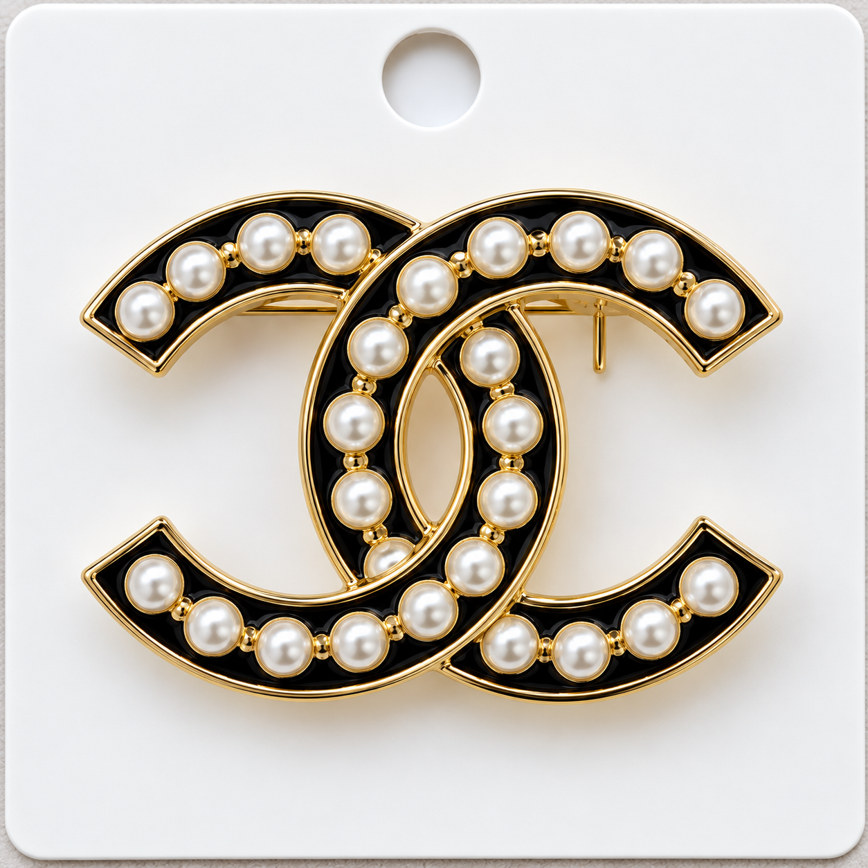 CC brooch