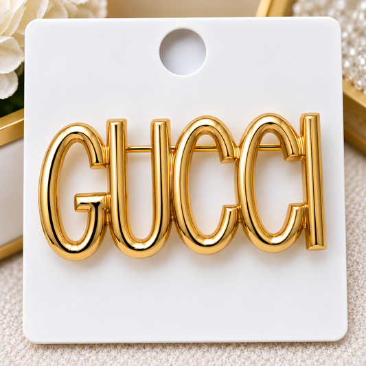 GG brooch