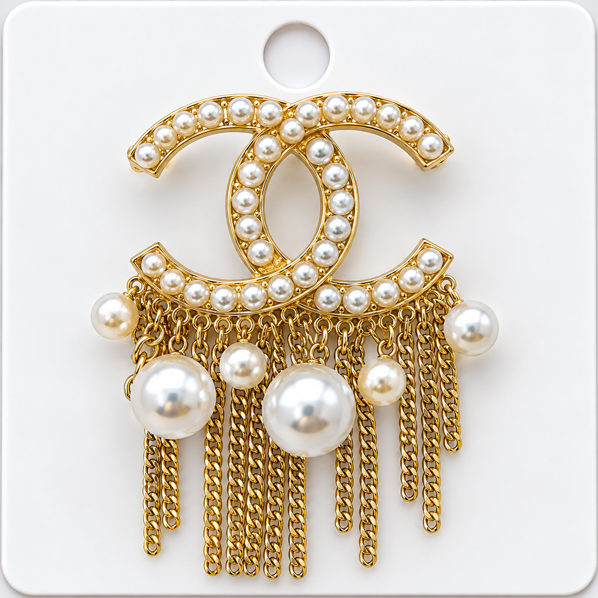 CC brooch
