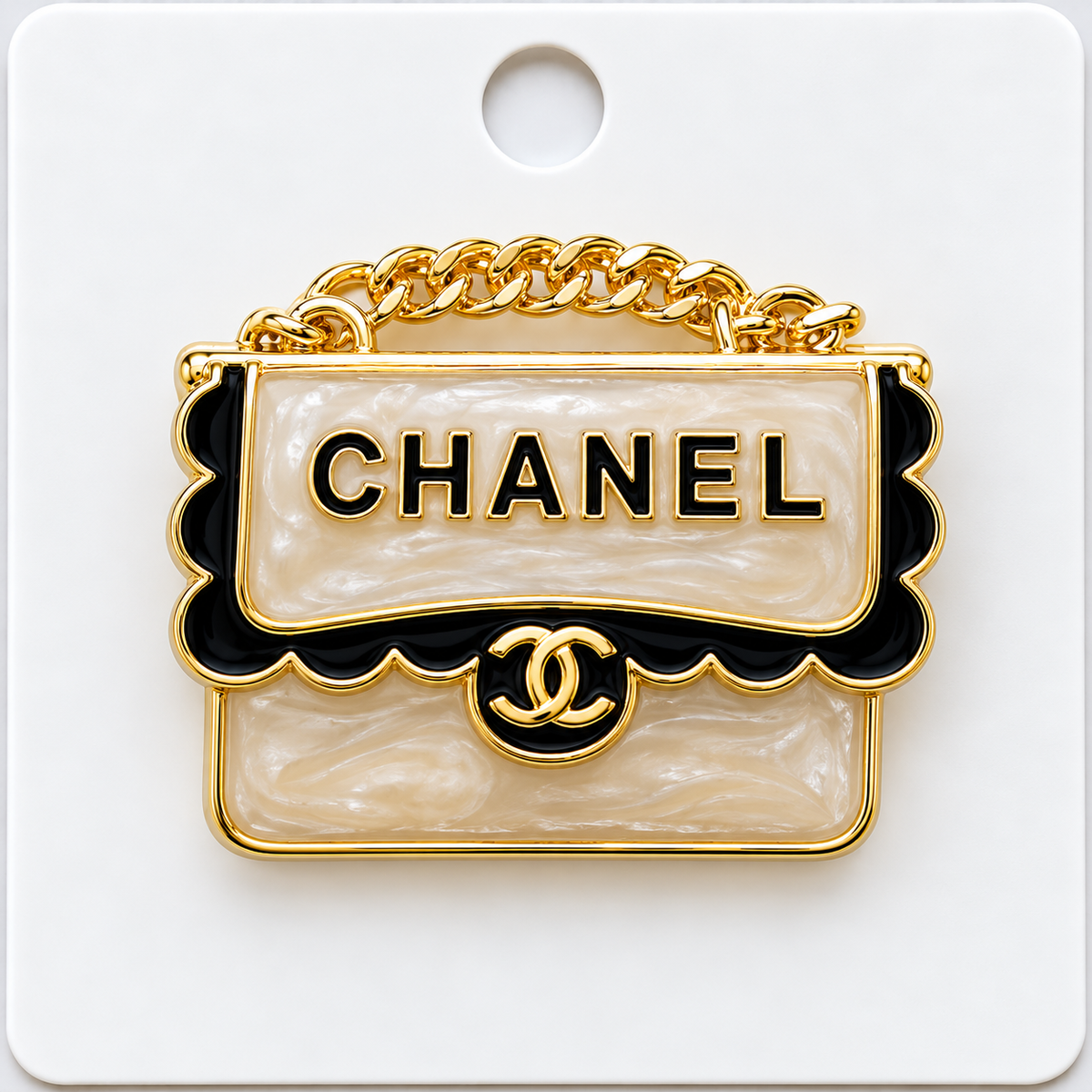 CC brooch