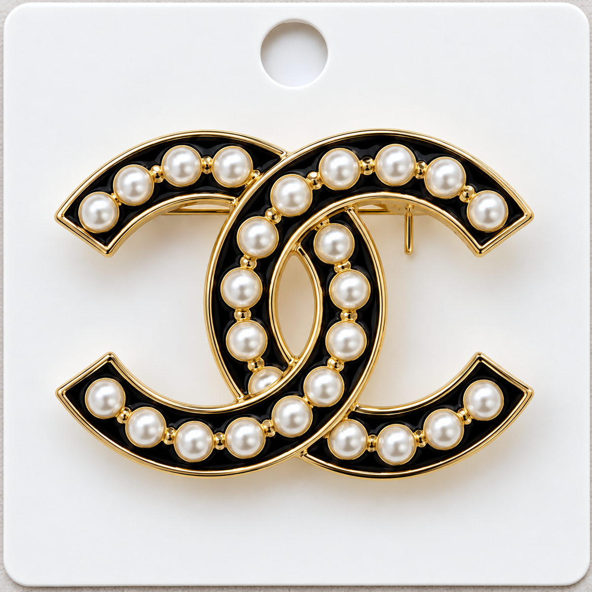 CC brooch