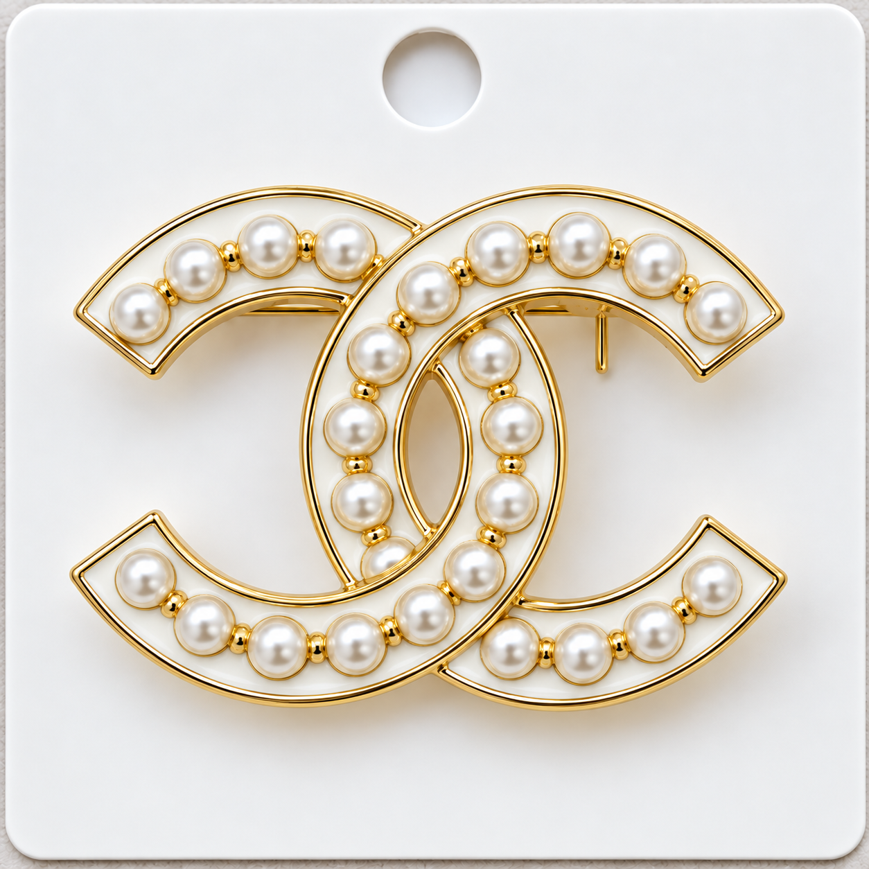 CC brooch