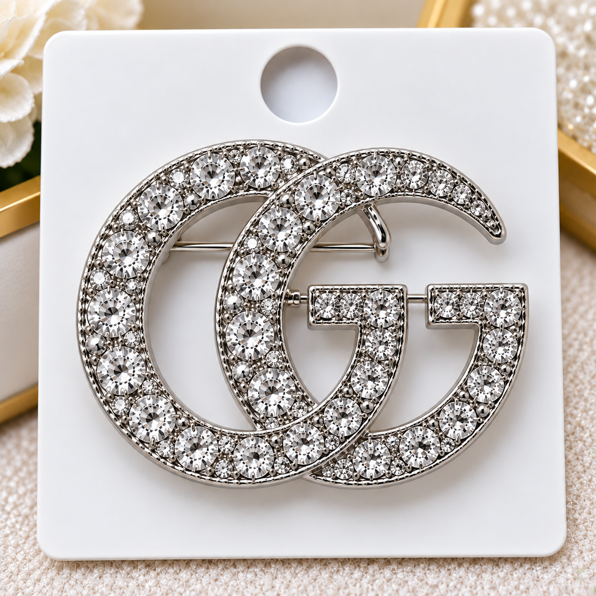 GG brooch
