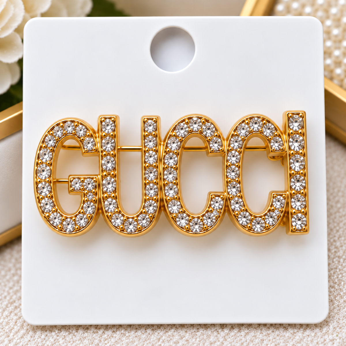GG brooch