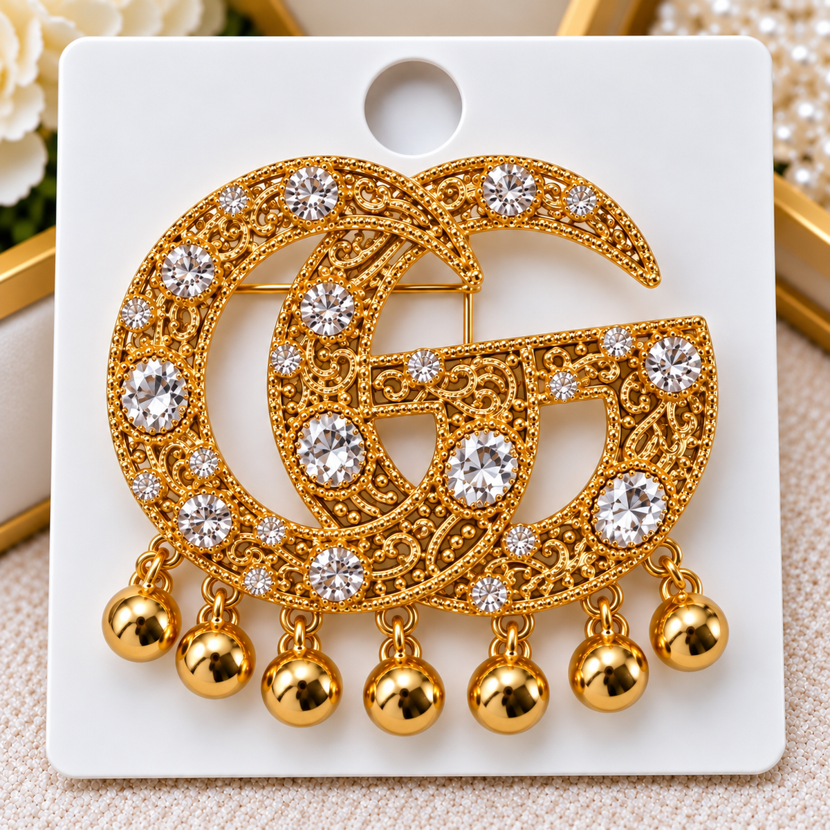 GG brooch