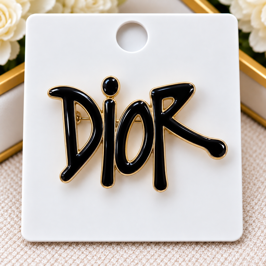 D brooch