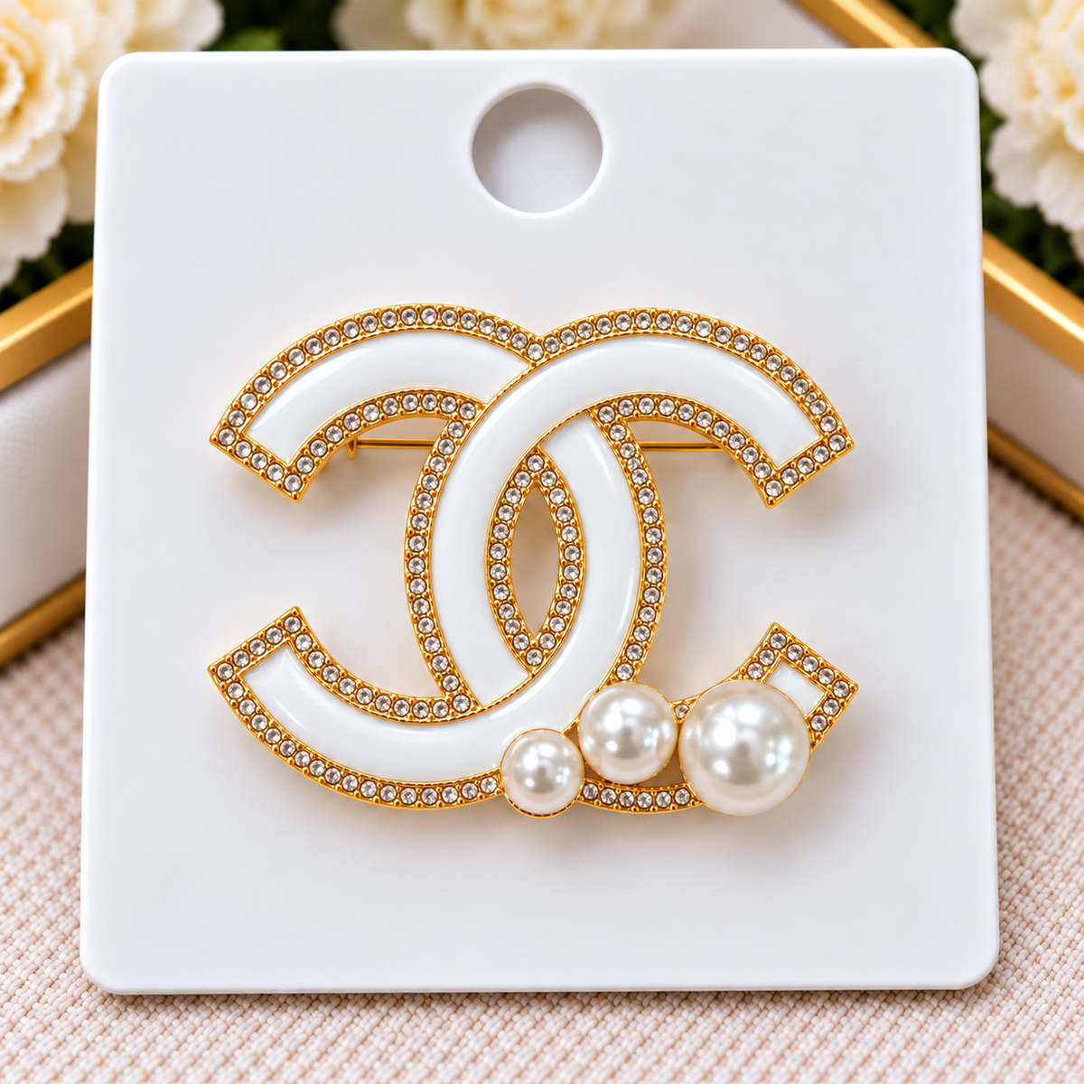 CC brooch