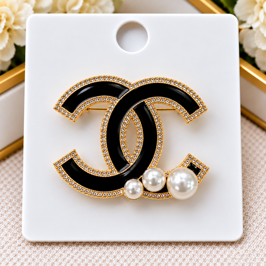 CC brooch