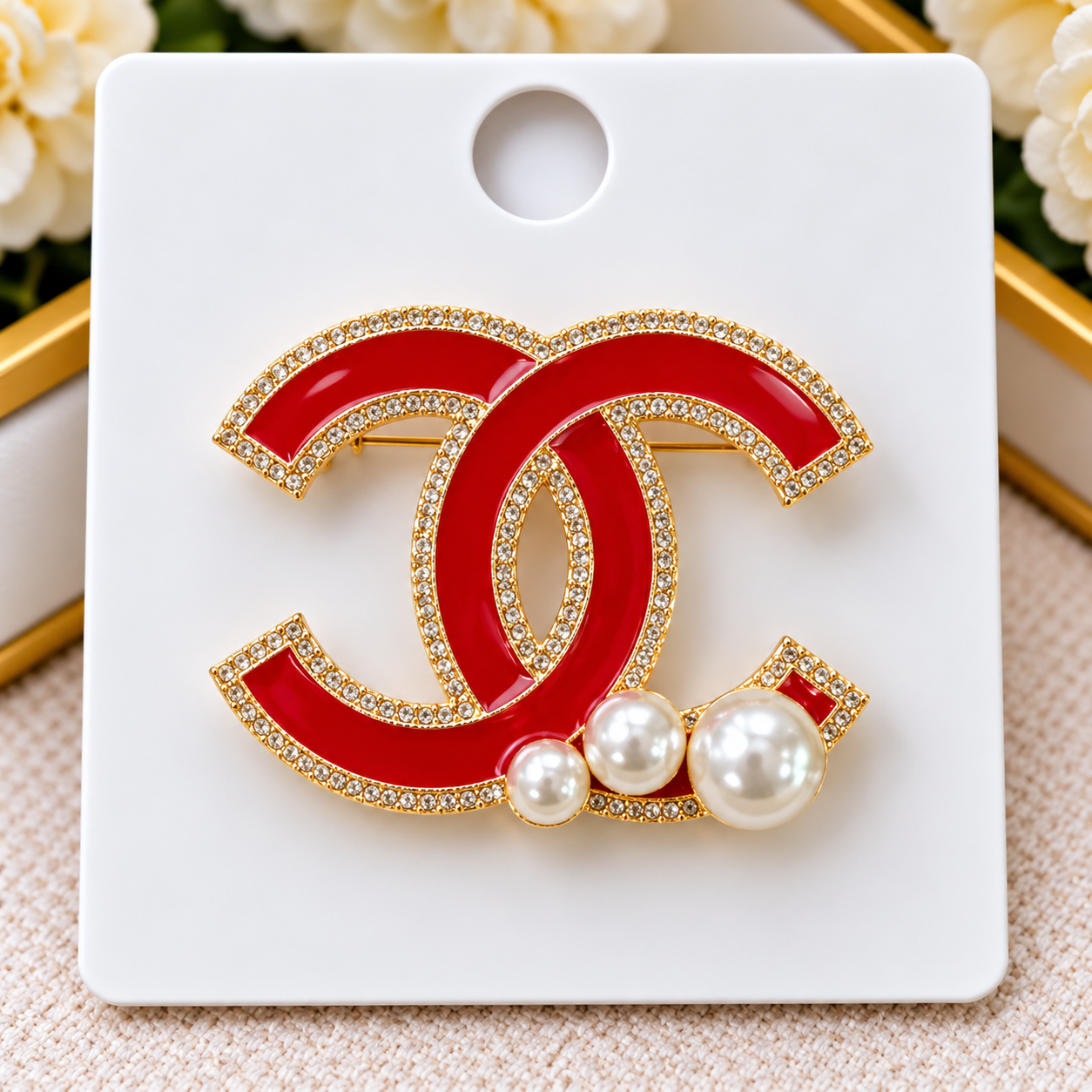 CC brooch