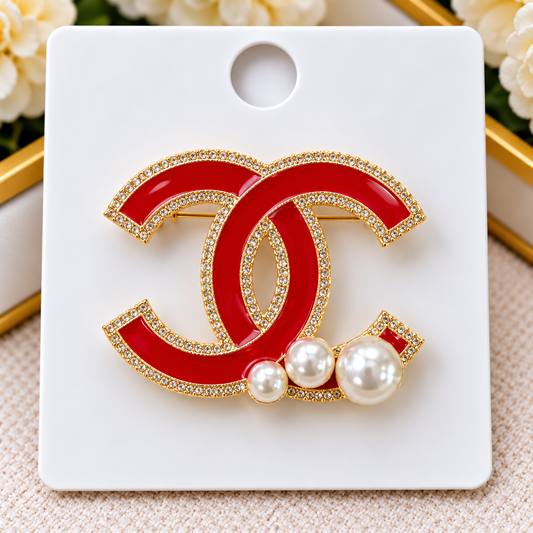 CC brooch